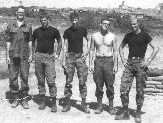"Albert" Gambrell, Dale Markovich, Doc Gilchrest, D.B. Brown and Roy Olson. The black T-shirts were a trademark of the team. Probably at Phan Thiet.